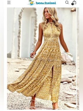 Yellow Ikat Halter Maxi Dress
Caja 9